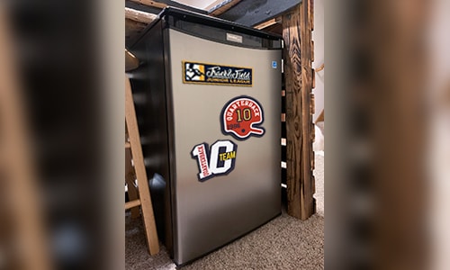 Beer fridge with sports magnets
